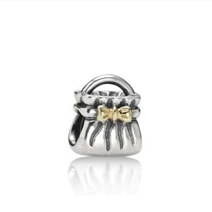Sterling silver w gold bow purse Pandora charm